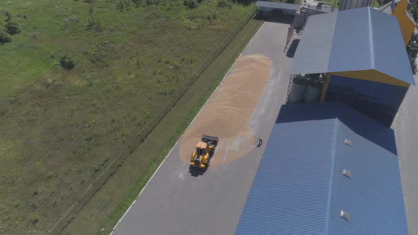 Aerial view of a machine loading harvest