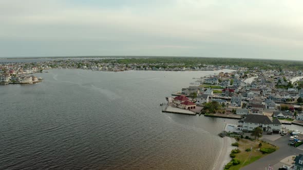 Drone Wide View of Local Residential Suburb of River in View of Distant Toms River