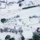 Aerial Overhead View of the Train Travels Through the Countryside in Winter - VideoHive Item for Sale