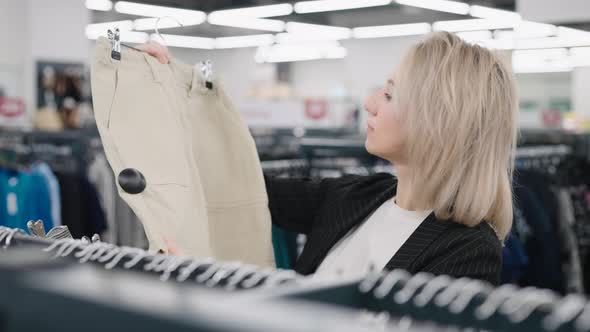 Elegant Woman in a Clothing Store