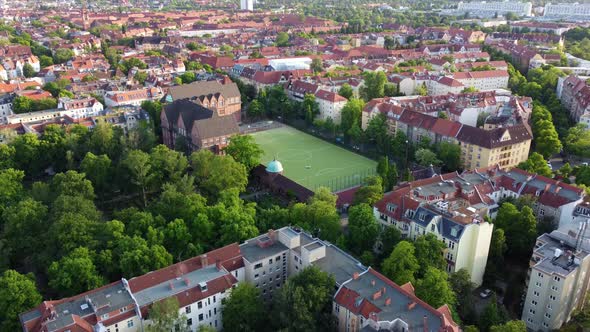 German school with large soccer field in the cityBeautiful aerial view flightpanorama overview dron