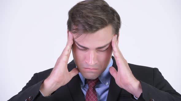 Young Stressed Businessman Having Headache