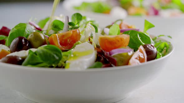 Fresh Green Salad with Cherry Tomato Mozzarella and Olives