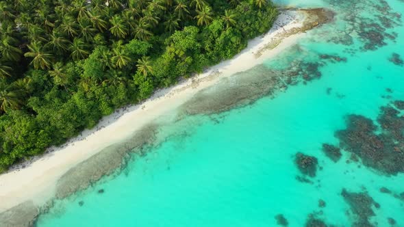 Aerial nature of tropical island beach break by blue ocean and white sandy background of adventure n