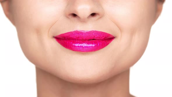 Cropped Portrait of Cheerful Woman with Bright Cosmetics on Lips Smiling Showing Her Happiness Over