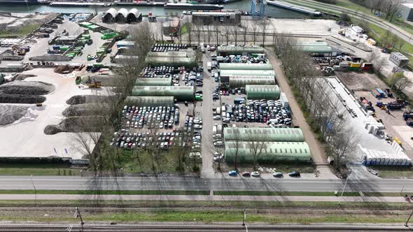 Scrapyard Compound Old Broken Discarded Wreckage Auto Vehicles on a Scrap Junkyard Facility for