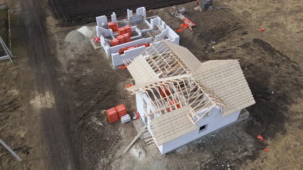 Aerial View of Unfinished Frame of Private House with Aerated Lightweight Concrete Walls and Wooden