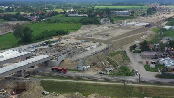 Road construction. View from above bridge construction over car highway