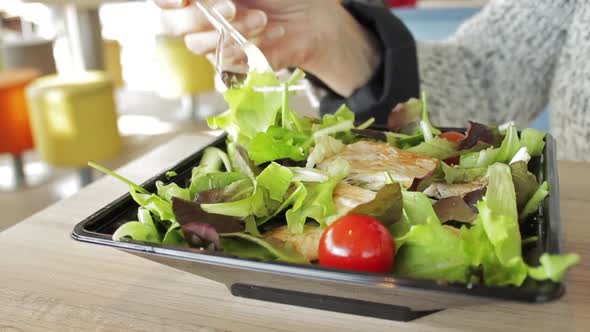 Eating Salad At Restaurant