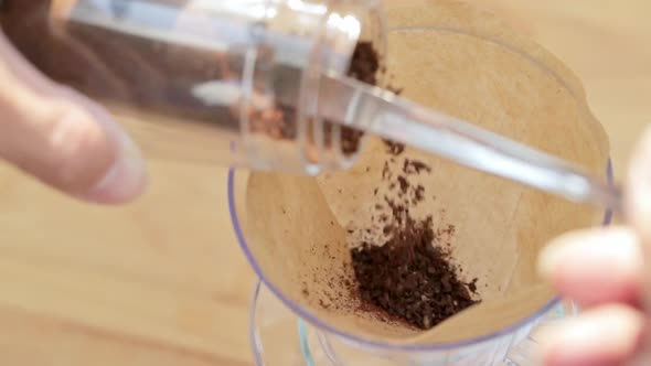 Pouring hot water into coffee filter with slow motion