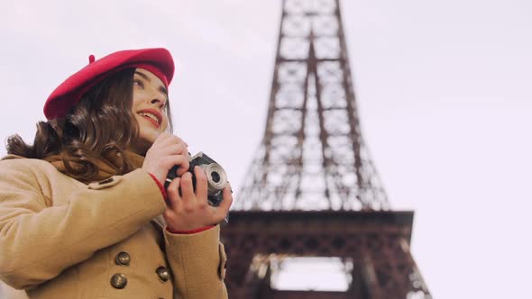 Creative Girl Catching on Camera Positive Moments in Paris, Enjoying Hobby