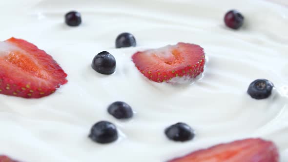 Delicious Strawberries and Blueberries in White Sour Cream