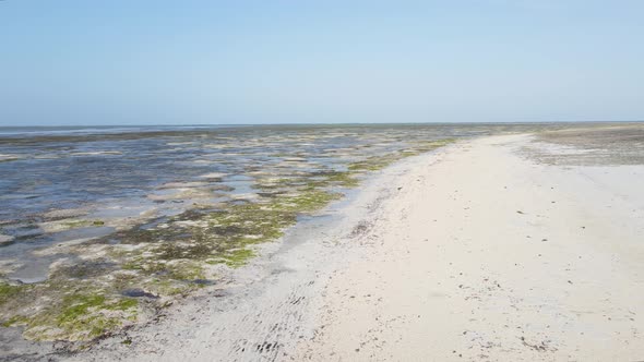 Aerial View of Low Tide in the Ocean Near the Coast of Zanzibar Tanzania Slow Motion