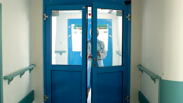 Female doctor using digital tablet