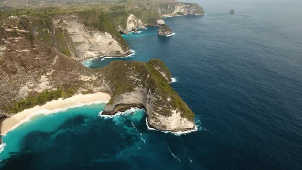 Rocky Cliff with Beach in the Sea