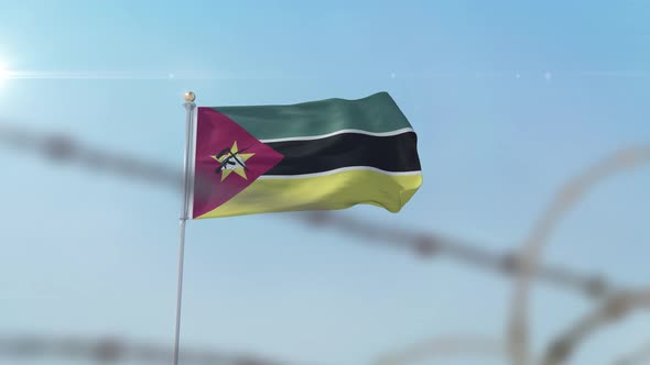 Mozambique Flag Behind Border alt