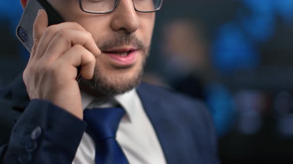 Bearded Business Male Mouth Talking on Smartphone at Hi Tech Hologram Office Extreme Close Up