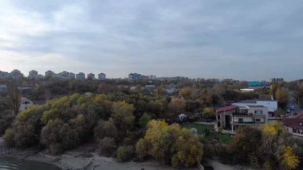 Lush Green Forest At The Riverbank Of Danube River In Galati City, Western Moldovia, Romania. aerial