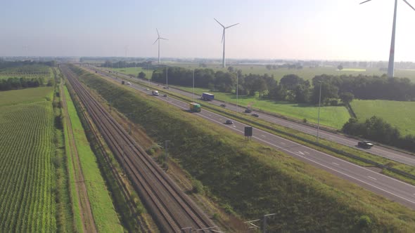 Overhead View of Cars Driving on a Highway Next to a Railroad During Summer in Belgium Europe