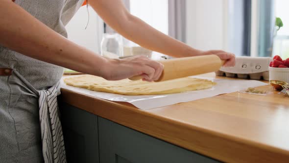 Woman Cooking Food and Baking on Kitchen at Home