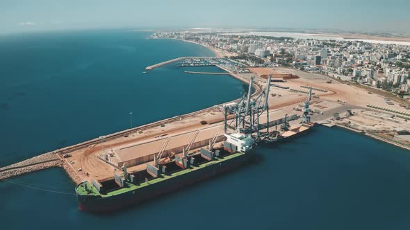 Aerial View Dry Cargo Ship at Pier in Port Sea