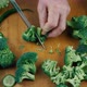 Close Up Knife Cutting Fresh Green Broccoli - VideoHive Item for Sale