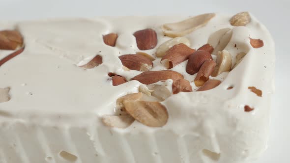White nougat halva with almonds 4K footage
