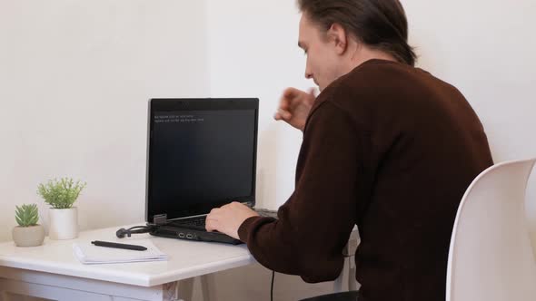 Man Smashed Laptop with Hammer