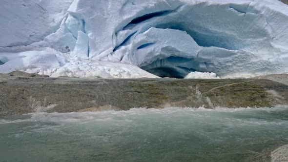 Jostedalsbreen National Park, Norway. Water Flowing From a Melting Glacier of an Ice Cave. FHD