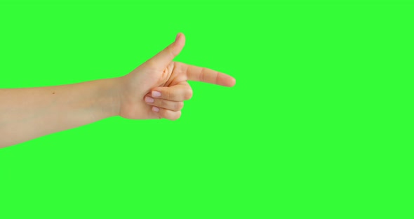 Isolated Woman Hand Showing the Hey You Sign Symbol Pointing Something. Green Screen
