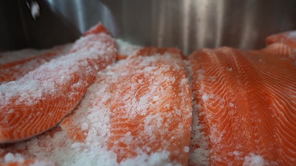 Rock salt sprinkling traditonal method of preserving salmon fish