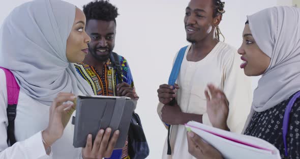 African Students in Traditional Clothes Planing and Preparing for Activity at University