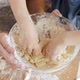 Closeup of Little Boy Mixing Dough in Big Glass Bowl - VideoHive Item for Sale
