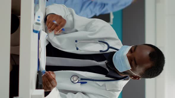 Vertical Video General Practitioner Giving Bottle of Pills As Prescription Treatment