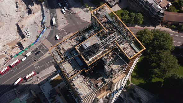 High Angle View of Top of Skyscraper with Crane and Scaffolding