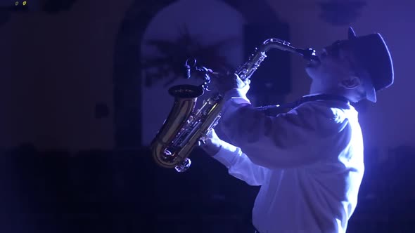 Musician Playing Alto Saxophone on a Gig Playing the Saxophone