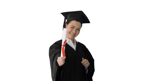 Graduation woman smiling and looking happy on white background.