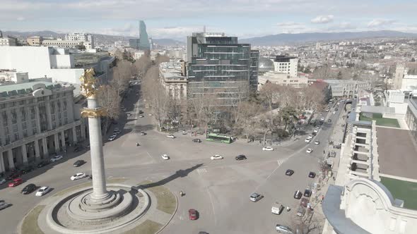 Flying over column of freedom in the center of Tbilisi, Georgia