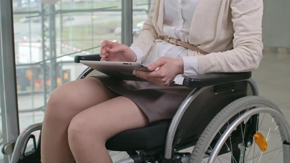 Disabled Woman With Tablet