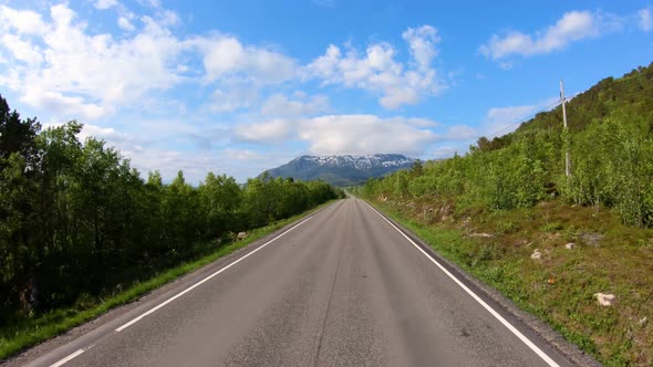 Vehicle Point-of-view Driving a Car on a Road in Norway