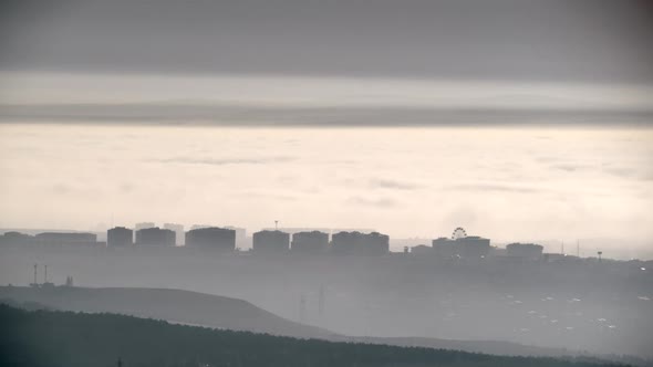 8K City On The Cloud And Fog Time-Lapse