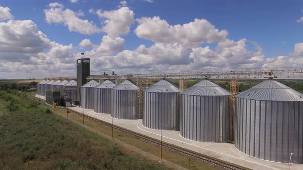 Grain Bins, Sky and Clouds.