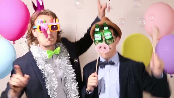 Party guys in photo booth