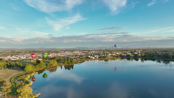 Hot air balloons transit towards city, footage reveals 6 balloons as part of the ballon festival in