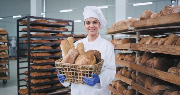 Portrait of Smiling Woman Baker with a Vintage Big