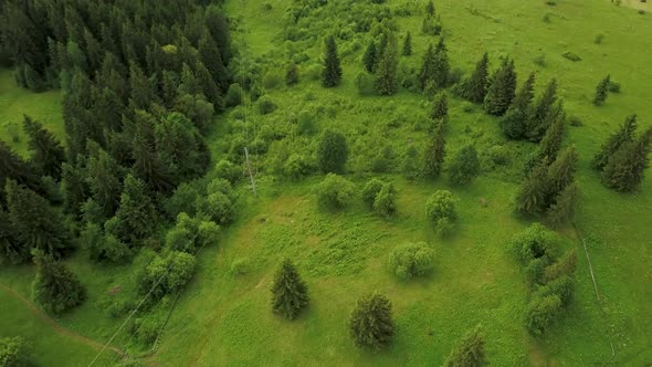 Drone flight over the Ukrainian Carpathians in summer. Fascinating landscapes in the mountains. Immo