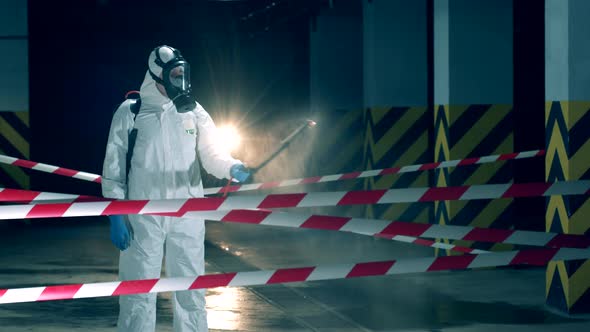 Sanitation Expert Is Spraying Chemicals During Disinfection