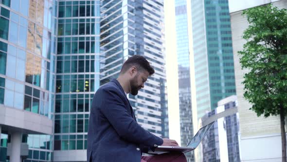 Businessman Working on a Laptop