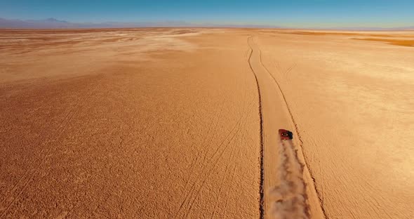 Off-road Vehicle Rides Across Breathtaking Remote Landscape