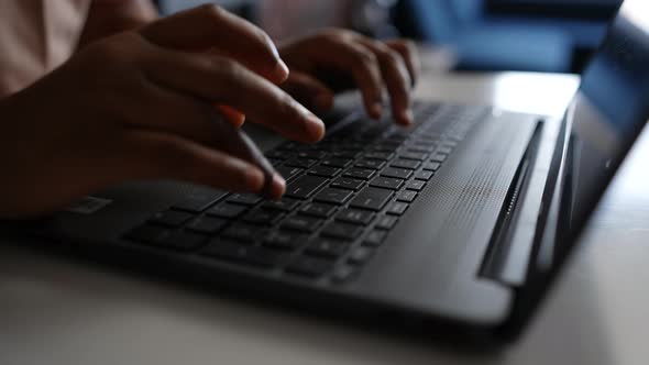 Closeup Fingers of Unrecognizable African American Businesswoman Press on Keyboard Keys Typing on